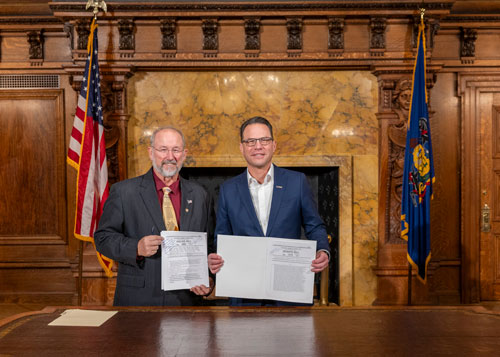 Rep. Dan Moul is pictured with Gov. Josh Shapiro at Monday’s ceremonial bill signing at the state Capitol.